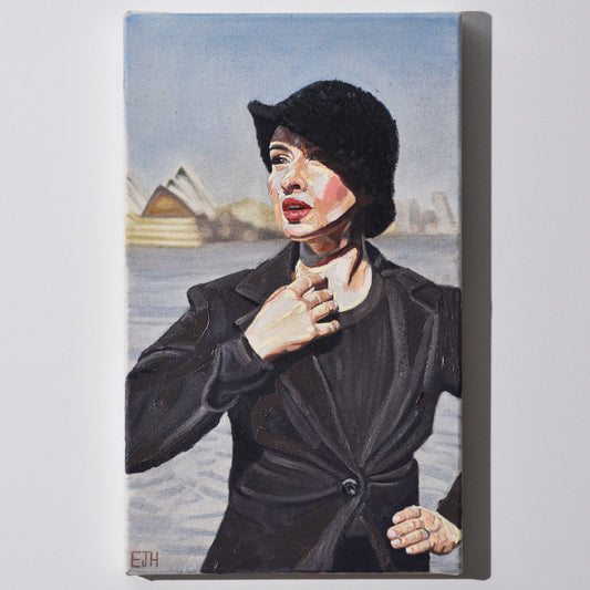 'Harbour View' oil painting hanging on a neutral wall in the artist's studio.