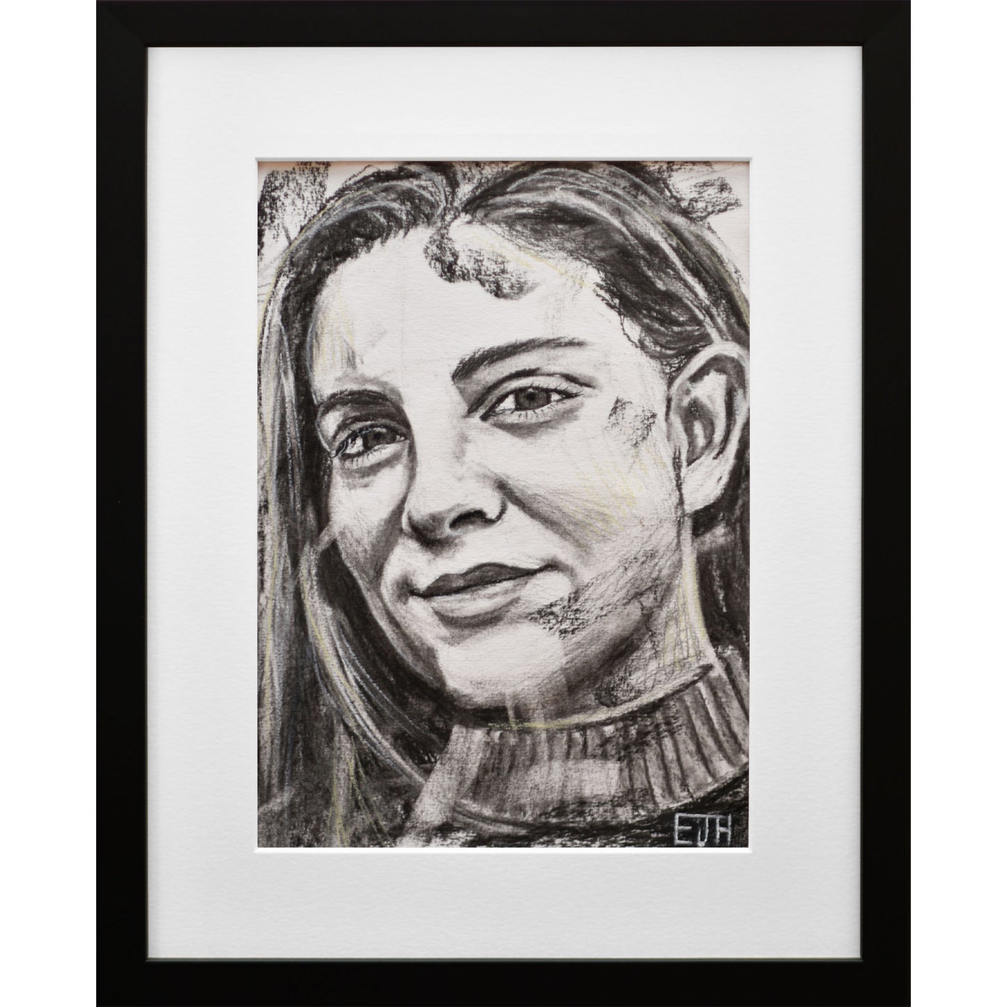 Framed portrait drawing titled 'Believe', 2024 depicting a female subject with a smile.