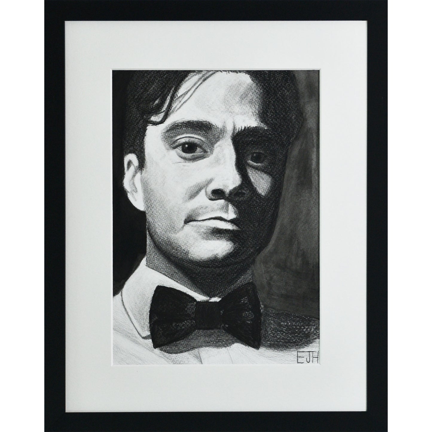 Framed portrait drawing titled 'Beneath The Surface', 2025 depicting portrait of a man with a bow tie.