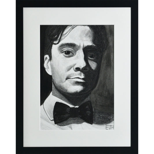 Framed portrait drawing titled 'Beneath The Surface', 2025 depicting portrait of a man with a bow tie.