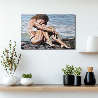 'Celestial Waves' oil painting of a woman sitting on a rock by the ocean hanging above a shelf with plants.