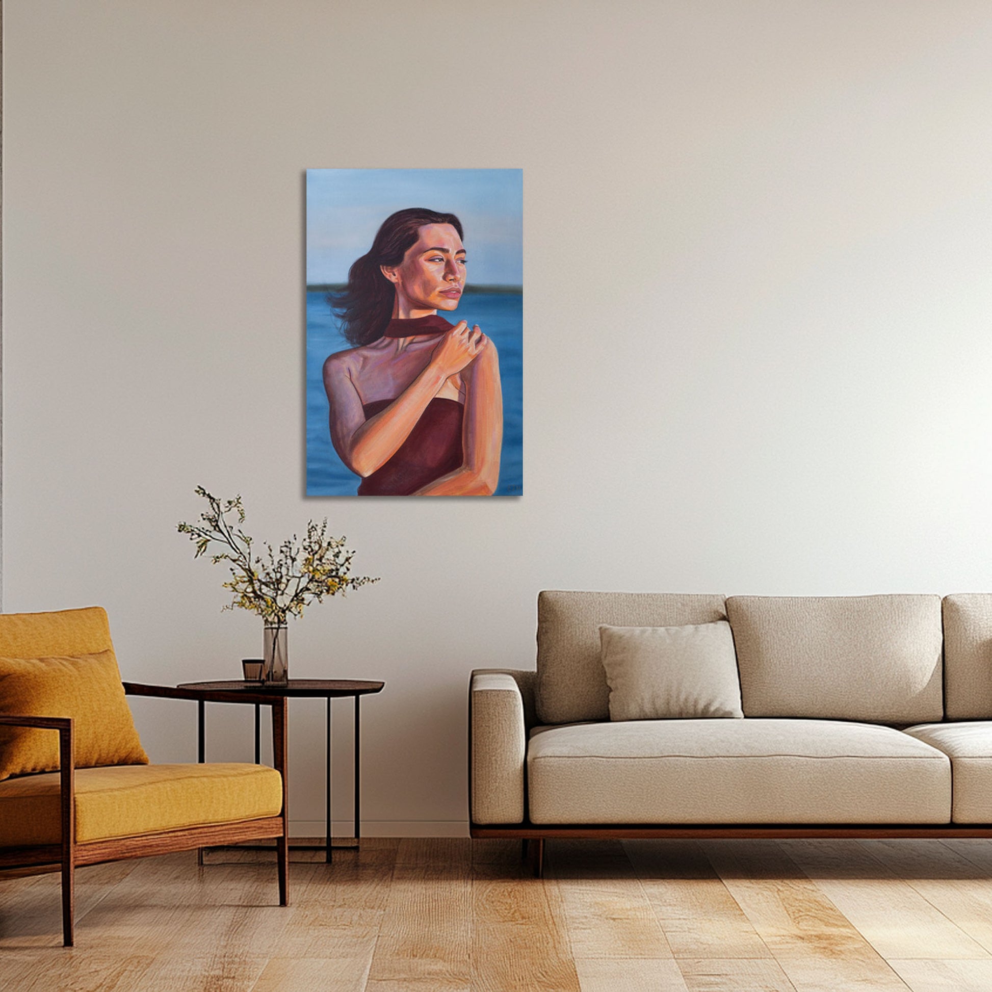 'Golden Hour' oil painting of a woman with a burgundy dress in living room with a beige sofa and yellow armchair.