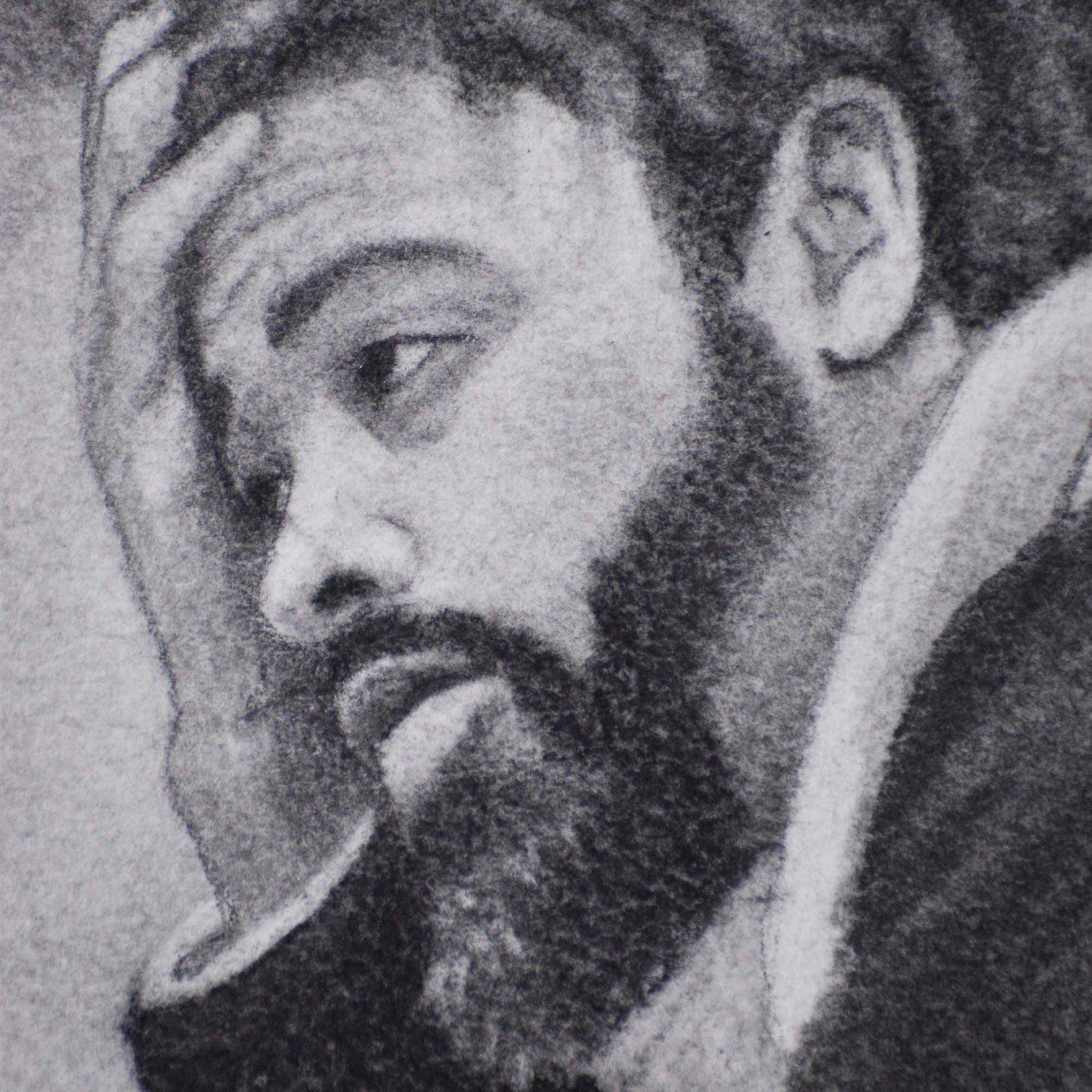 Close-up of bearded man's sad expression in a Contemporary portrait drawing.