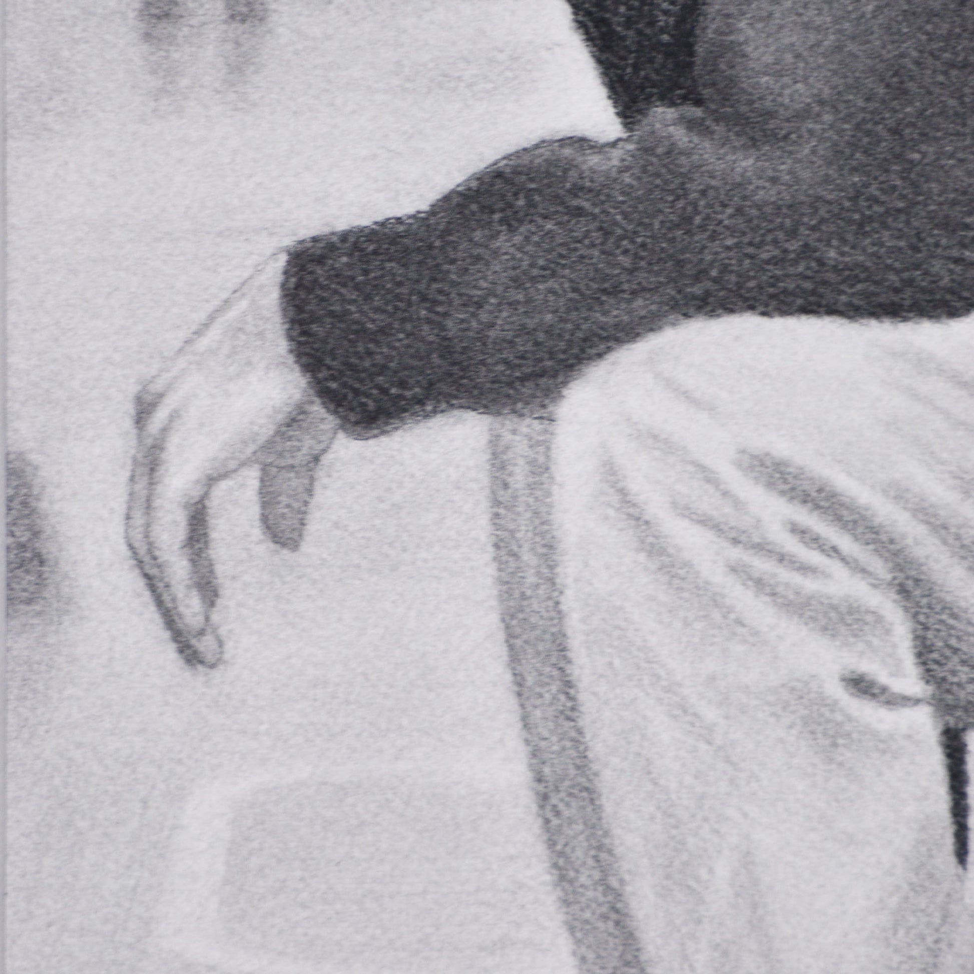 Close-up of a man's hand with a dark jacket and light pants in a Contemporary portrait drawing.