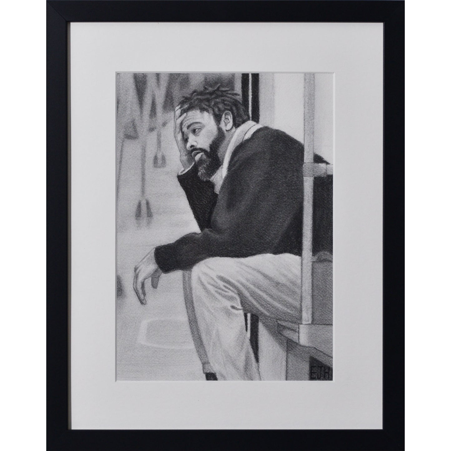 Framed portrait drawing titled 'Lost In My Head', 2025 depicting a man sitting on a metro seat.