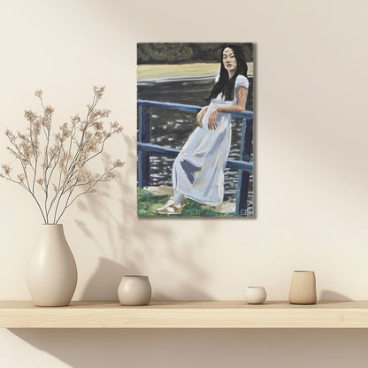 'Near Lavendar Bay' oil painting of a woman in a white dress displayed on a wall above a shelf with decorative vases.
