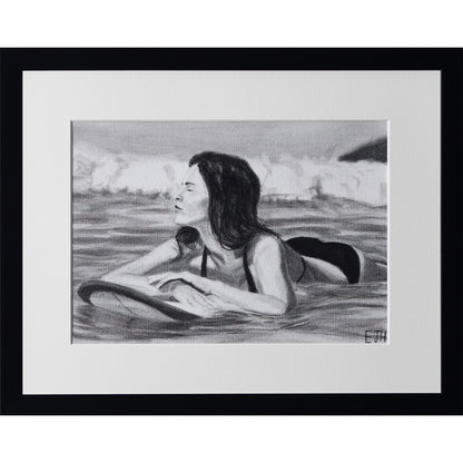 Framed portrait drawing titled 'Soul Surfer', 2025 depicting a female subject in water with a surfboard.