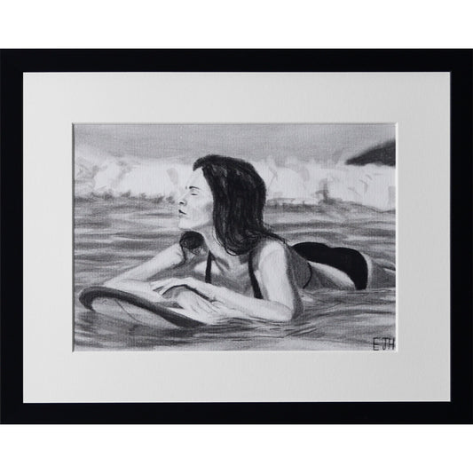 Framed portrait drawing titled 'Soul Surfer', 2025 depicting a female subject in water with a surfboard.